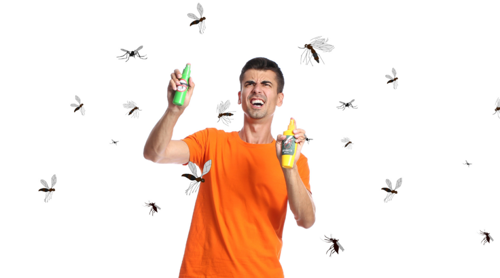 man spraying repellent chaotically at mosquitoes