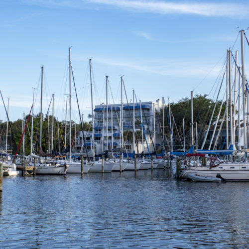 Evening image of Melbourne, Florida, harbor with several sailing vessels in dock. Melbourne is a popular tourist destination a short distance from the Kennedy Space Center, Port Canaveral, and the Orlando theme parks. The intracoastal waterway, or Indian River, flows by Melbourne and miles of some of Florida's best beaches are also in Melbourne.Melbourne, Florida03/12/2020